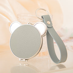 Bear-Head Shaped PU Leather Compact Mirror Keychain - Cute Teddy Bear Double-Sided Folding Travel Mirror with Plastic Frame - Pocket Purse Charm Vanity Mirror with Wrist Lanyard for Women, Girls & Students 🐻✨