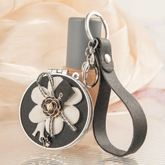 Camellia Flower Compact Mirror Keychain, Stylish Double-Sided Folding Makeup Mirror with 95% High Reflectivity, Portable Pocket Mirror with Wrist Strap for Purse/Travel, Gift for Women & Fashion Lovers