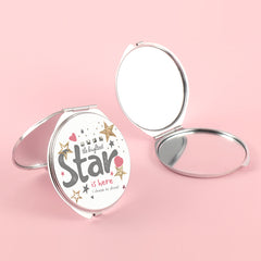 The silver plated round double-sided makeup mirror has a colored glue drop pattern