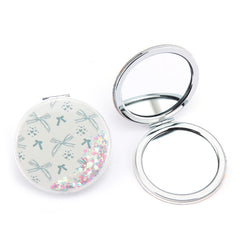70mm Round Quicksand Dual-Sided Travel Makeup Mirror - Portable Pocket Mirror with Sparkly Flowing Glitter for Purses & Handbags - Compact Mirror with 95% High-Reflectivity Eco-Friendly Glass for Girls, Women, & Gift-Giving - Whimsical Bowknot & Hear