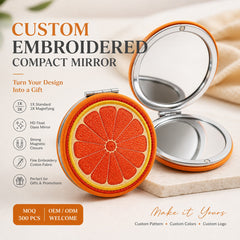 Custom embroidered compact mirror with orange embroidery, 1X and 3X mirrors, OEM ODM