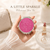 Raspberry rhinestone compact mirror handheld beauty accessory lifestyle scene