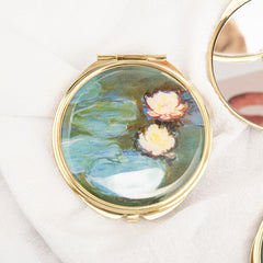Gold folding compact mirror with water lily painting