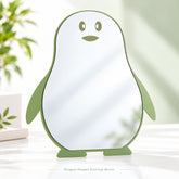 Green penguin-shaped tabletop mirror front view