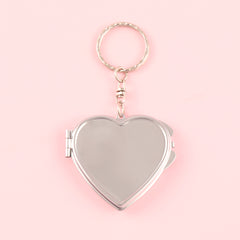 DIY Heart-shaped Keychain Makeup Mirror with Dual Glass Panels, Silver Electroplating, Metallic Charm, Compact 50mm Size. Elevate your beauty game with this on-the-go essential! 💄🔑