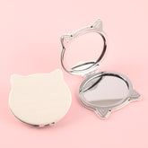 Exquisite Cat-Shaped Mirror, 60*75mm White Leather Wrap, Metallic Frame, Silver Electroplating – Perfectly Compact for Your Makeup Must-Haves!