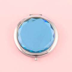 Dream Blue Crystal Glass Button Cosmetic Mirror, Light And Luxurious ,Silver Plating, Fashionable Metal Frame, Round Design Blooming Elegant Luster, Let Your Every Moment Shine Like A Gem,Available In Three Colors,Blue, Yellow and Pink