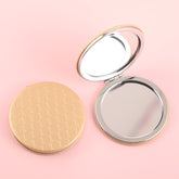 Beautiful Round Plating Silver Frame, Cross-Pattern PU Eco-Friendly Leather Embellishment, HD 60*60mm Makeup Mirror, Clearly Showing the Details of Makeup, The Perfect Choice for Both Fashion and Environmental Protection.