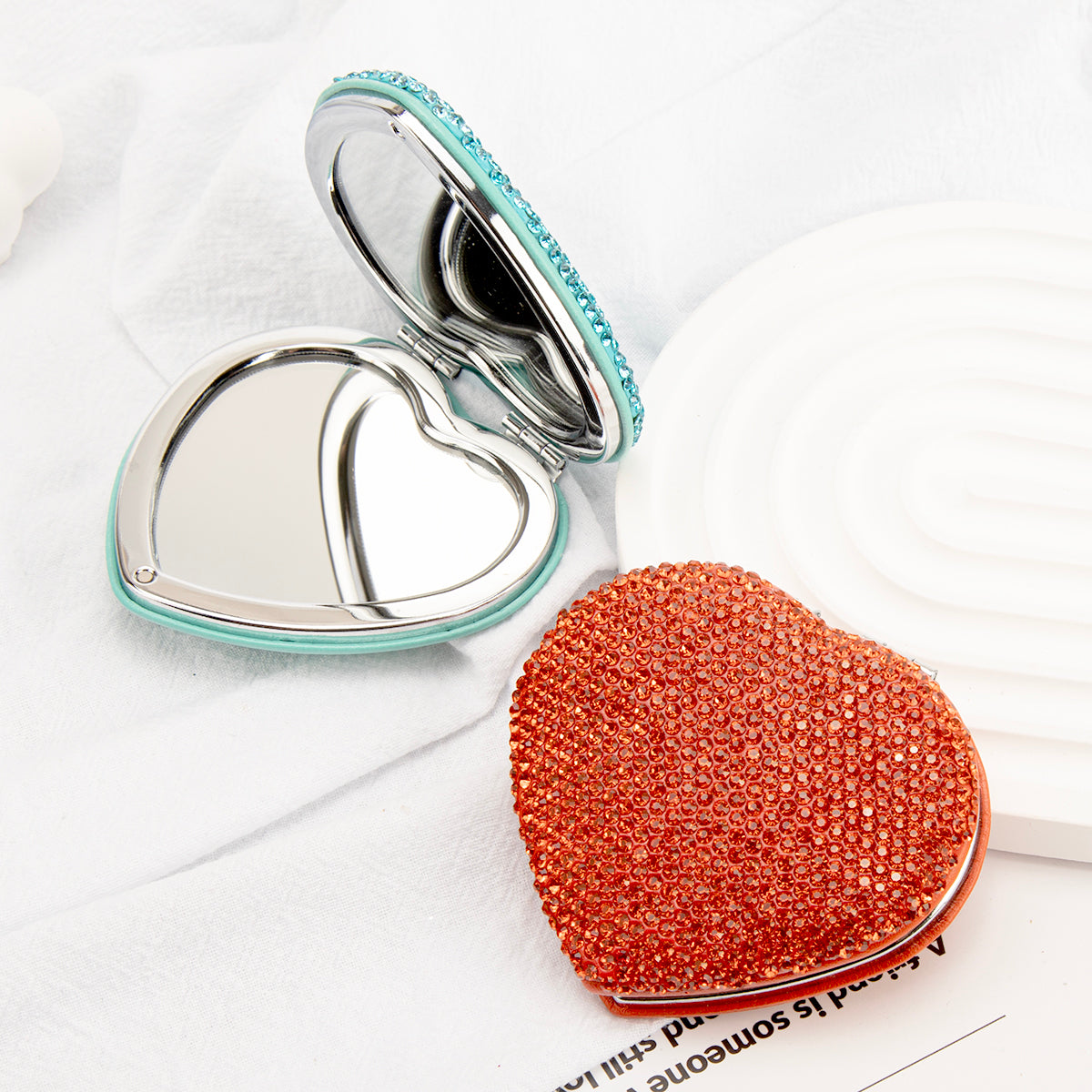 Red heart shaped rhinestone compact mirror detail