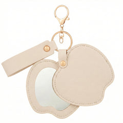 Apple-shaped PU leather compact mirror keychain with double-sided glass and swivel folding design
