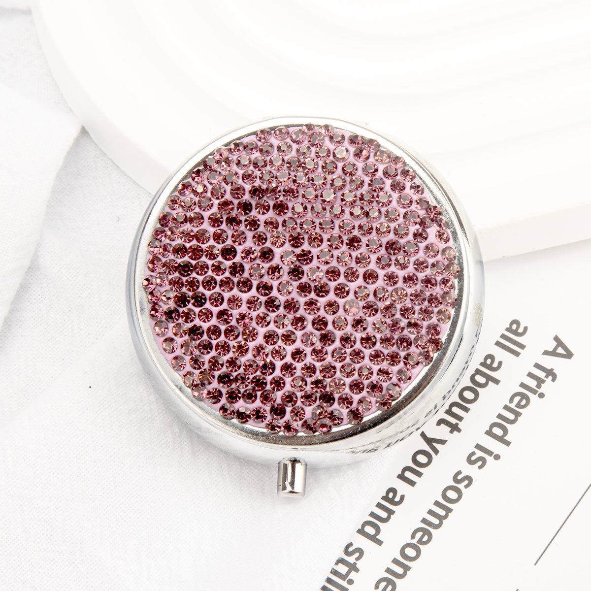 Round rhinestone travel pill organizer detail