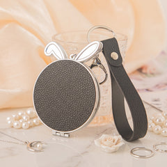 Rabbit-Ear Shaped PU Leather Compact Mirror Keychain - Cute Bunny Ears Double-Sided Folding Travel Mirror with Plastic Frame - Pocket Purse Charm Vanity Mirror with Wrist Lanyard for Women, Girls & Students 🐰✨