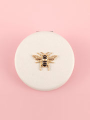 Vintage honeybee PU leather compact mirror with gold-tone bee emblem and double-sided glass