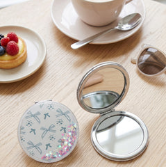 70mm Round Quicksand Dual-Sided Travel Makeup Mirror - Portable Pocket Mirror with Sparkly Flowing Glitter for Purses & Handbags - Compact Mirror with 95% High-Reflectivity Eco-Friendly Glass for Girls, Women, & Gift-Giving - Whimsical Bowknot & Hear