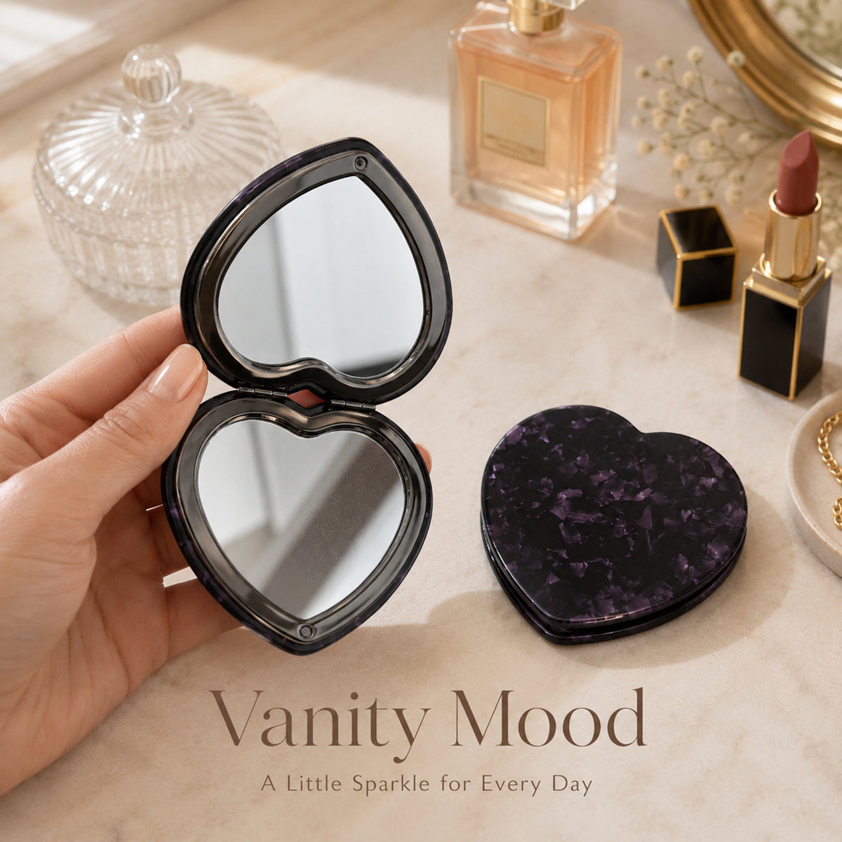 Heart-shaped acetate compact mirror in a light luxury vanity setting