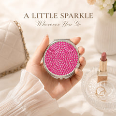 Raspberry rhinestone compact mirror handheld beauty accessory lifestyle scene