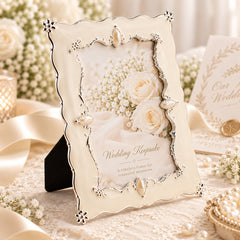 Vintage pearl photo frame styled as a wedding keepsake
