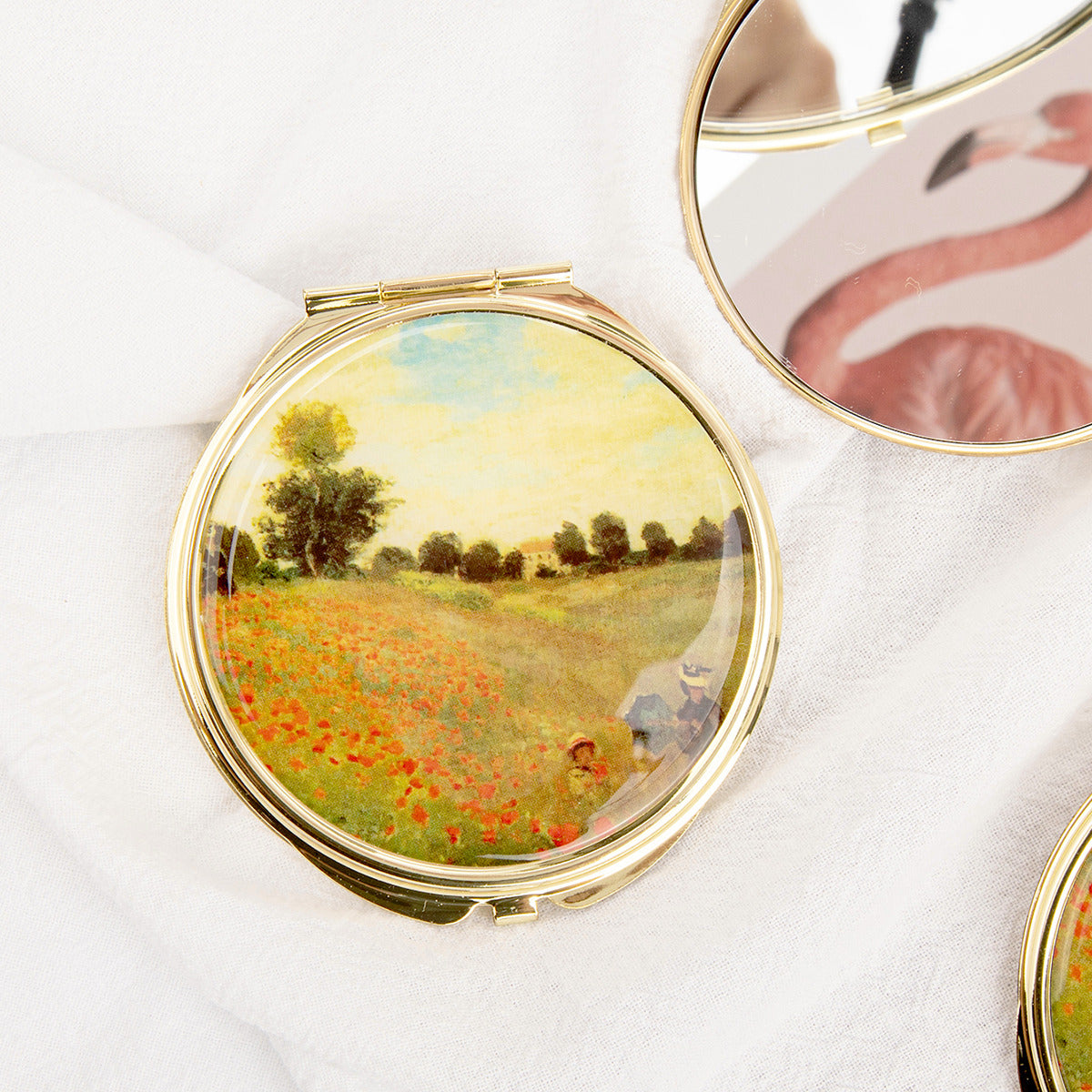 Gold folding compact mirror with poppy field painting