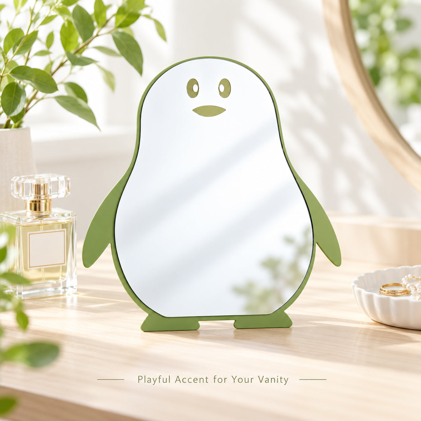 Green penguin tabletop mirror on vanity table