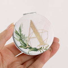 1 PC 7cm Round Double-Sided Folding Makeup Mirror PU Leather With Letter Pattern 2X Magnification Compact Portable Design Perfect For Precision Makeup Ideal Gift For Mother Daughter Sister Girlfriend Suitable For Home Office Travel And More