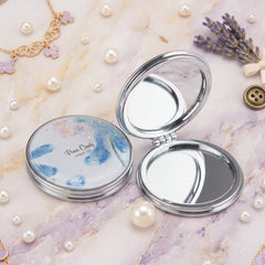 Sparkling Quicksand Liquid Printed Compact Mirror - Cute Round Silver Plastic Frame Double-Sided Folding Pocket Vanity Mirror with Floating Glitter & HD Glass for Purse, Travel & Gifts ✨⏳🪞